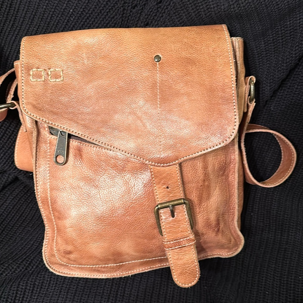New without tags.Smoke free home. Bag is 10 in high, 9wide and 2inches  deep.